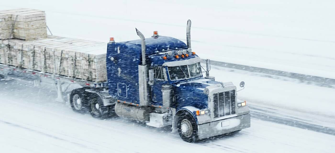 snow truck tires in road.jpg